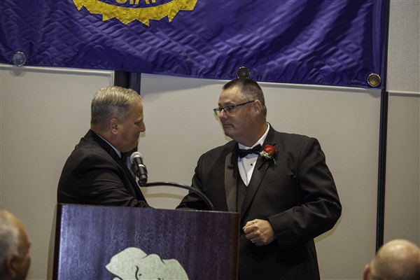 Outgoing President David Steffen congratulating Incoming President David Splain