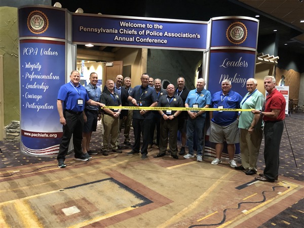 President David Splain conducting the ceremonial ribbon cutting with the Board of Directors