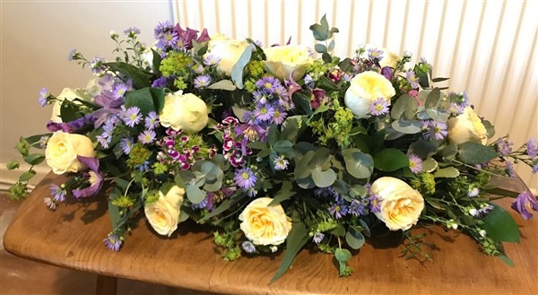 Casket Spray, Buttercup roses and Purples 2ft