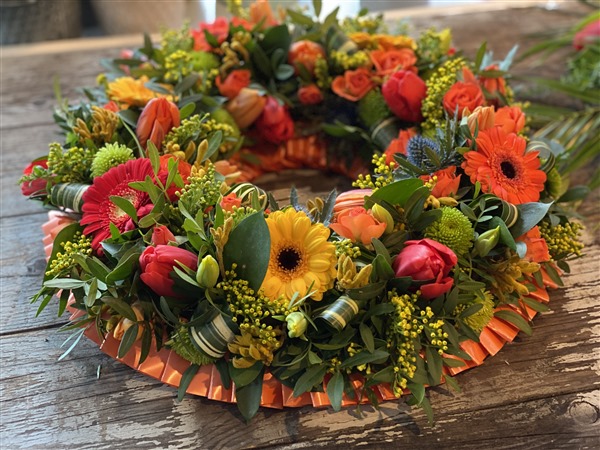 Wreath. Open style, orange germini, yellow, tulips, Spring
