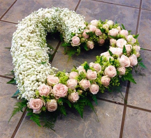 Heart. Gypsophila, spray roses, Pink and white Open Heart.