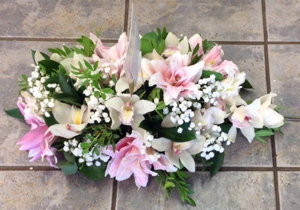 Posy, Small with double pink lilies and cymbidium orchids, gypsophila