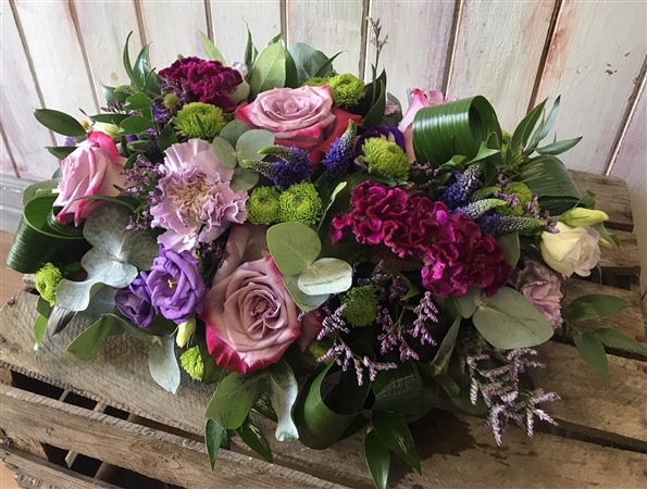 Posy. Long and low, pinks and purples,  18