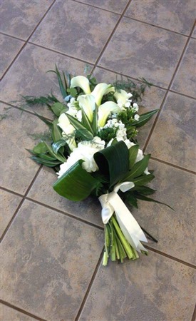 Sheaf. Funeral Sheaf. White Calla Lilies and hydrangea