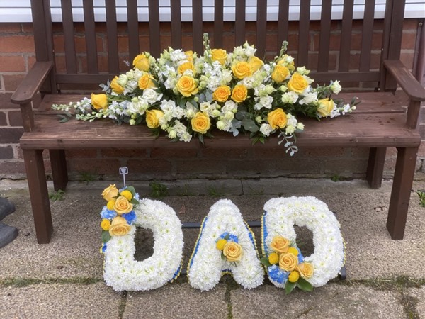 Casket Spray and Letters Yellow and Blue