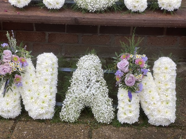Letters. NAN with gypsophila central letter