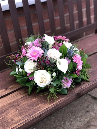 Posy. Small domed posy with white Calla and Roses