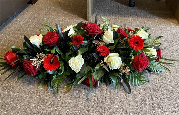 Casket Spray. Red, white and black