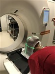 Patient undergoes treatment planning CT simulation
